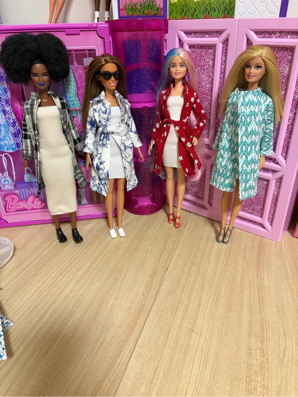 Barbie Dolls with White, Black, Blue, Red, Teal Coats